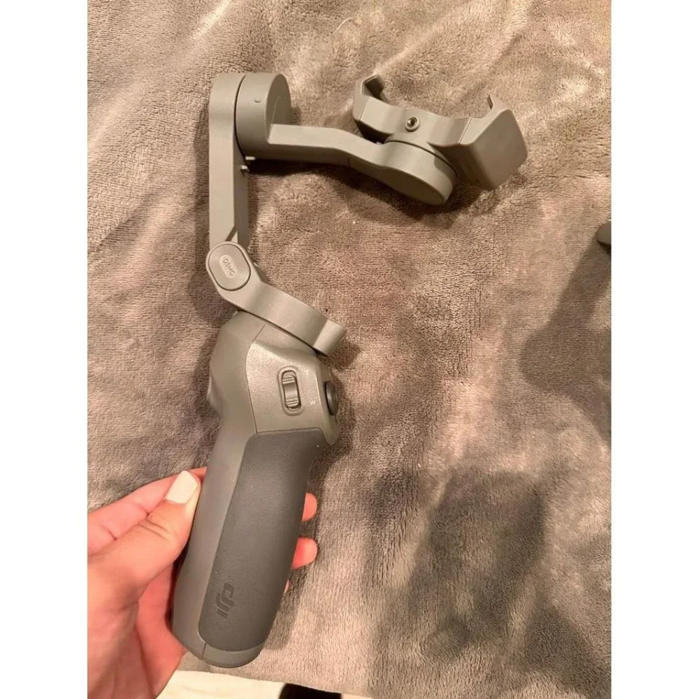 DJI OM 4 - Handheld 3-Axis Smartphone Gimbal Stabilizer with Grip, Tripod,Gimbal